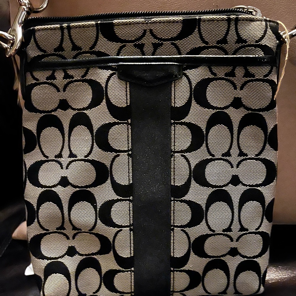 Coach cross-body purse.
